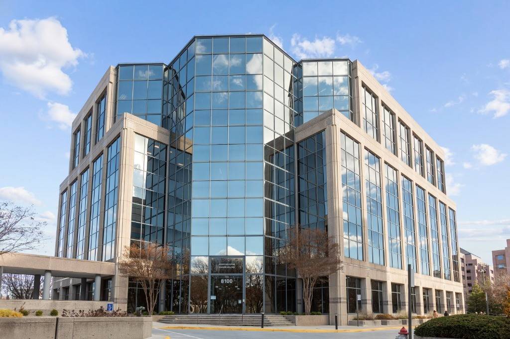 The glass office building at 8100 Boone Blvd, Vienna