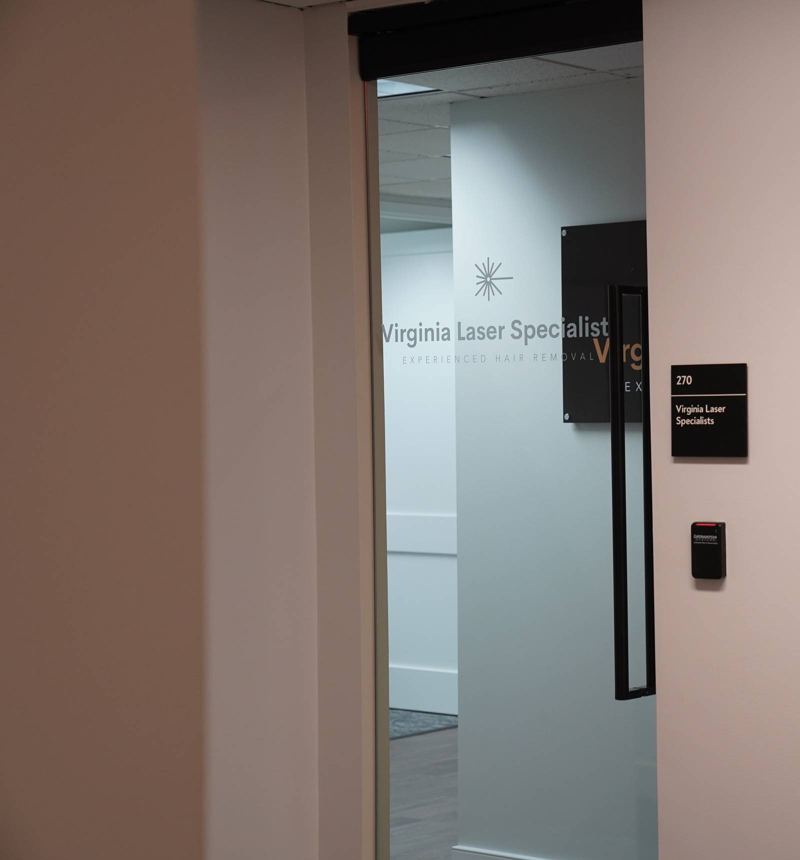 The door to Suite 270 with the Virginia Laser Specialists logo
