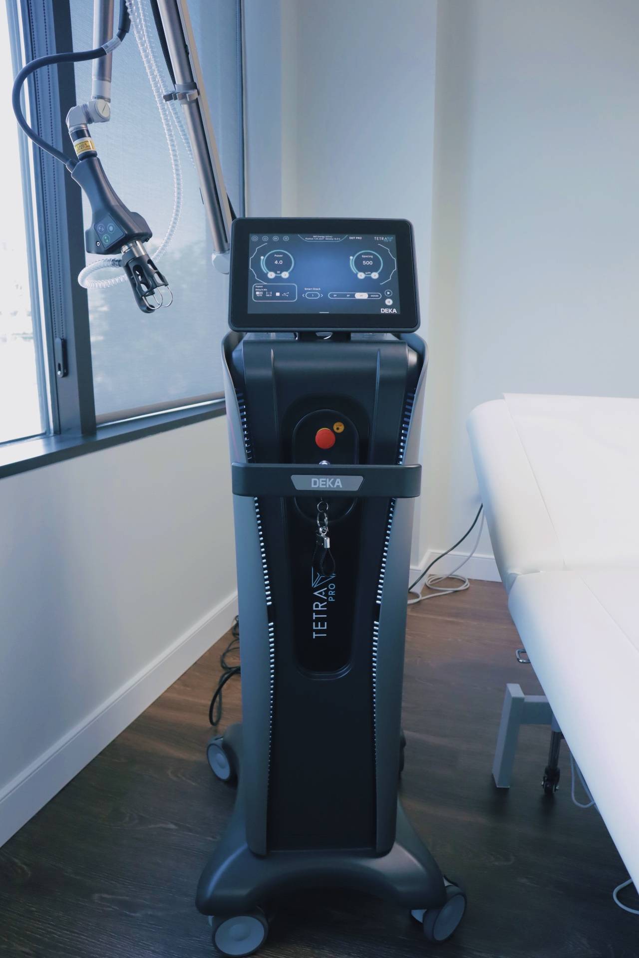The Tetra Pro CO2 laser standing by the window in a treatment room